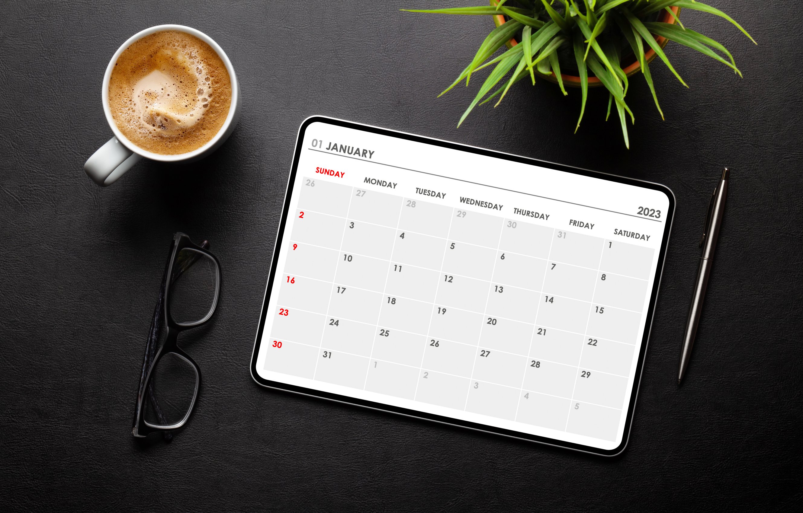 tablet-with-calendar-app-coffee-cup-and-office-su-2023-11-27-05-00-49-utc